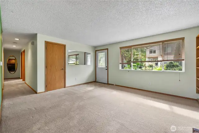 Looking back from the dining area to the living room and front of the house.