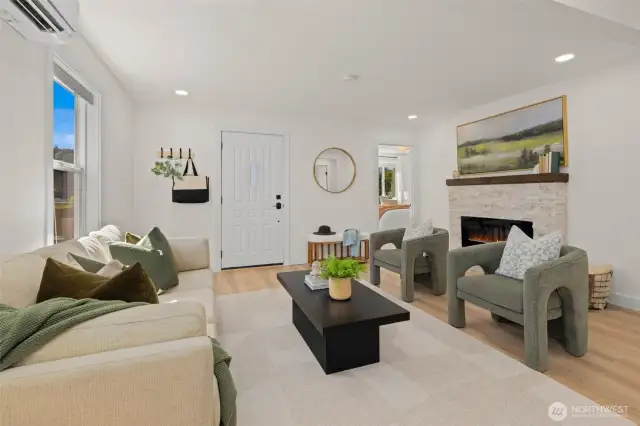 Spacious bright living room w/ a modern electric fireplace