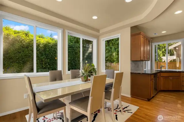The dining space can accommodate a large gathering or an intimate dinner with views of the backyard.
