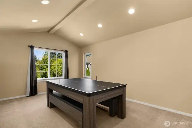 Fun media room located at the top of the stairs.