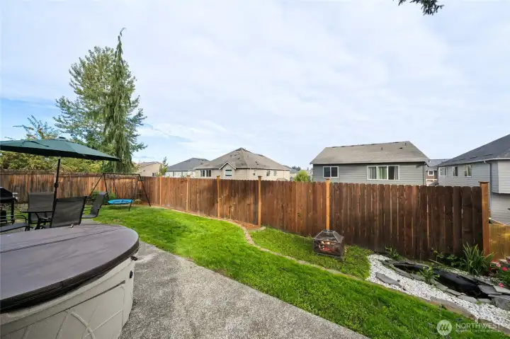 Enjoy the hot tub and beautiful pond on the right side.