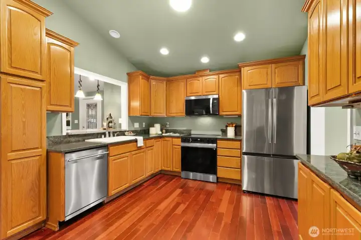 Kitchen is open to great room addition at back of home.