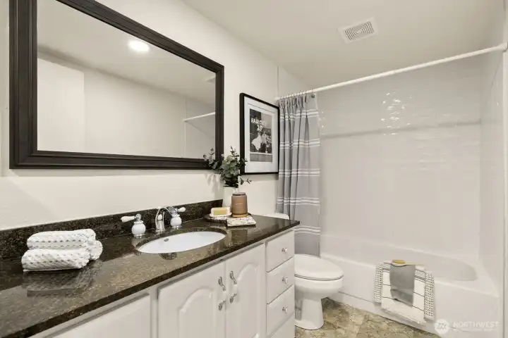 Main hall bath with new tile surround!