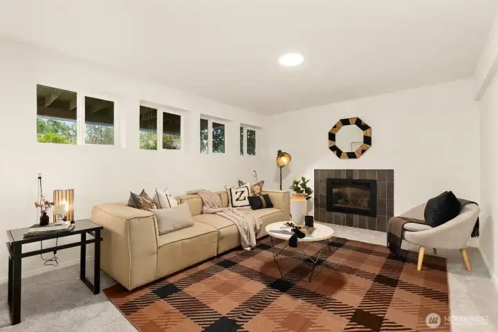 Lower level family room with fireplace.