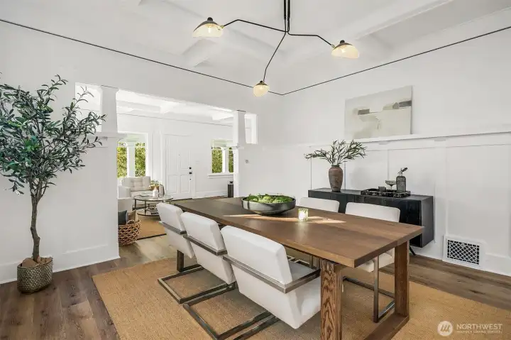 Lovely formal dining room with box beam ceilings and tons of south light.