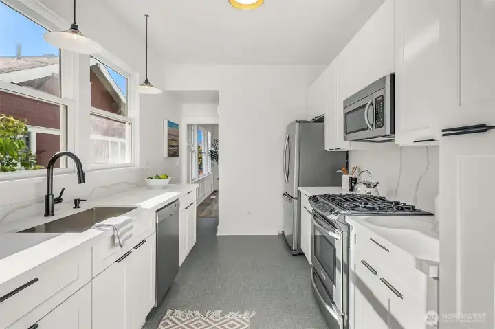 South facing light filled kitchen with new cabinets and countertops.