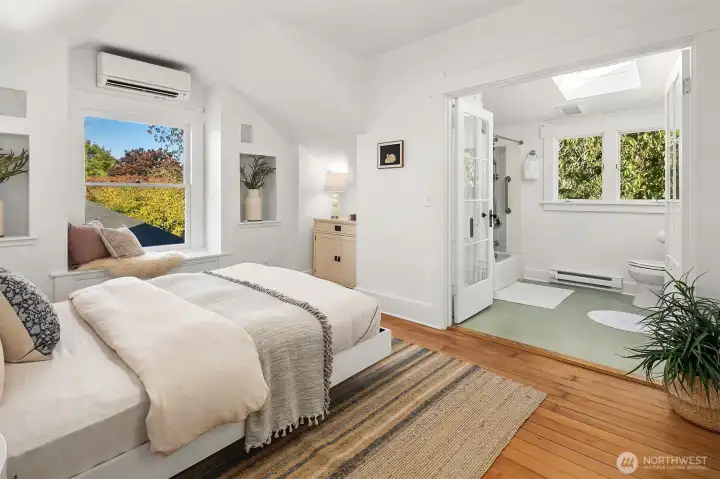 Primary suite bedroom with mini-split.