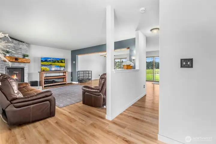 Take a look at this large living area with custom stone fireplace. Has a propane insert fireplace that was just done in the last two years.