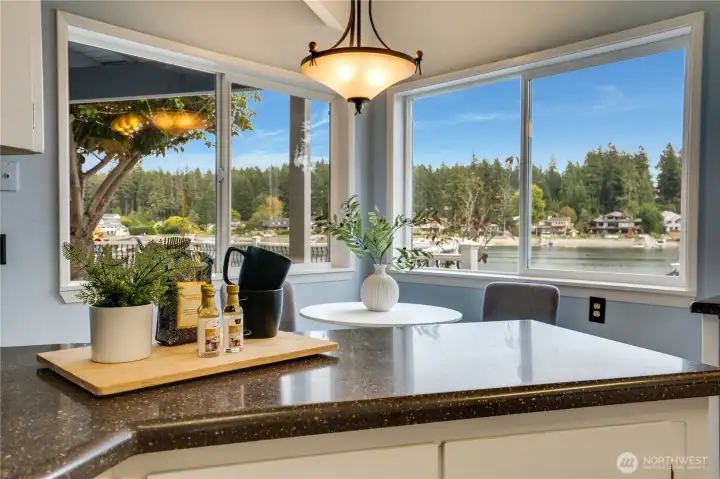 Cook with a view—this well-planned kitchen features double ovens and multiple windows
