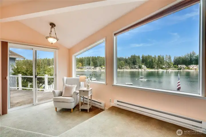 Primary Suite seating area leading out to the private deck.