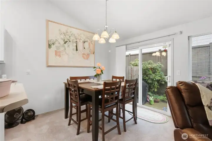 Dining area convenient to side yard in case you want to do some BBQing.