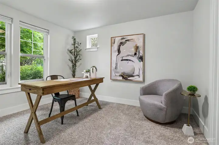 This office/bedroom space with it's own bath.