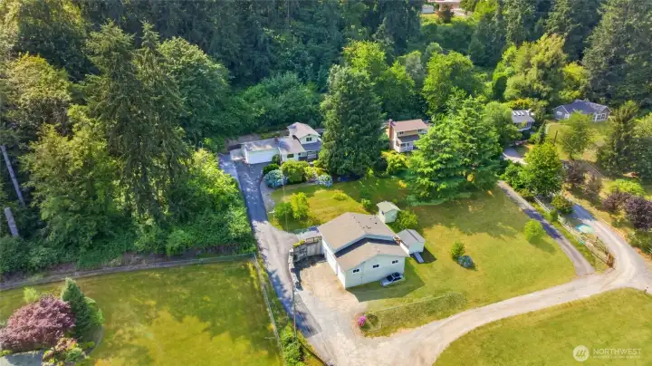 Birds eye view of Home at top of drive and Shop and Office building on the right as you drive up to house Birds eye view of Home at top of drive and Shop and Office building on the right as you drive up to house