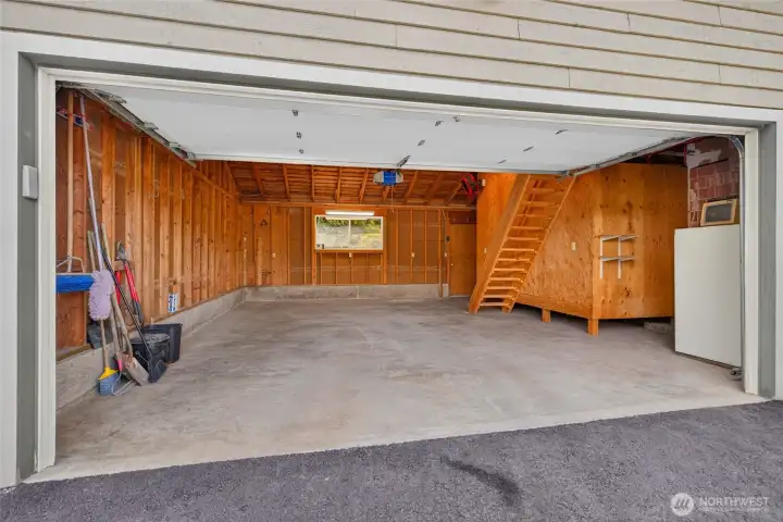 Attached 2 car garage with tremendous storage in loft above Attached 2 car garage with tremendous storage in loft above
