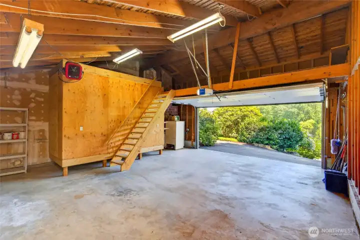Looking up to storage area above the garage Looking up to storage area above the garage