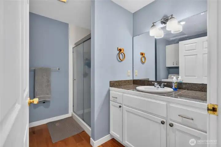 3/4 Bathroom within the upstairs Office and 1/2 Bath down below in Workshop Area 3/4 Bathroom within the upstairs Office and 1/2 Bath down below in Workshop Area