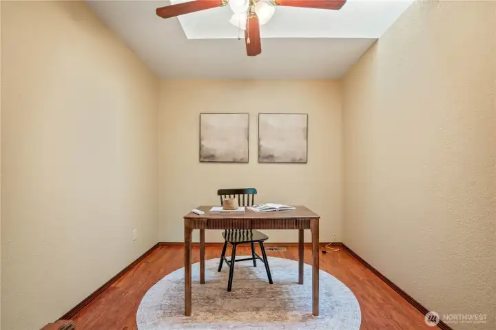 Office photo on the main floor. Natural light with skylight and fan Office photo on the main floor. Natural light with skylight and fan