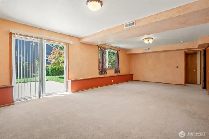 Another view of the flexible living area with its own daylight basement access. Another view of the flexible living area with its own daylight basement access.