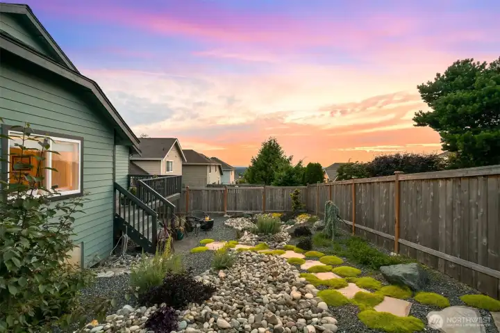 Cedar privacy fence encloses backyard Cedar privacy fence encloses backyard