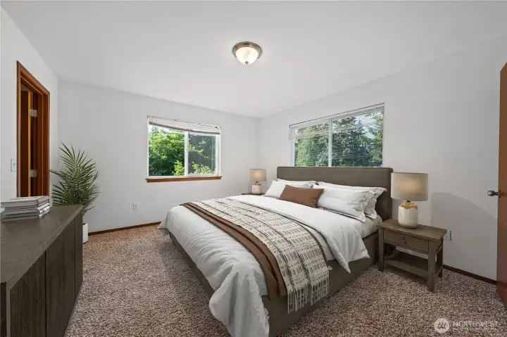 Spacious Primary bedroom~has a walk-in closet... Spacious Primary bedroom~has a walk-in closet...