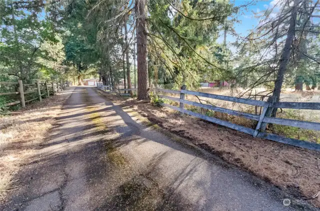 Long driveway access adds to the privacy.
