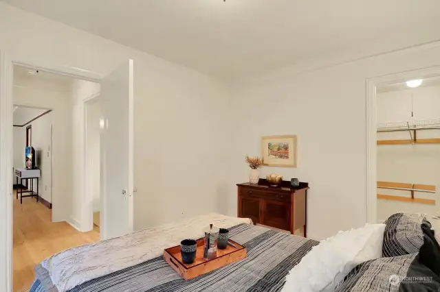 Conveniently located, the bedroom sits at the end of the hallway with no common walls to the main living areas