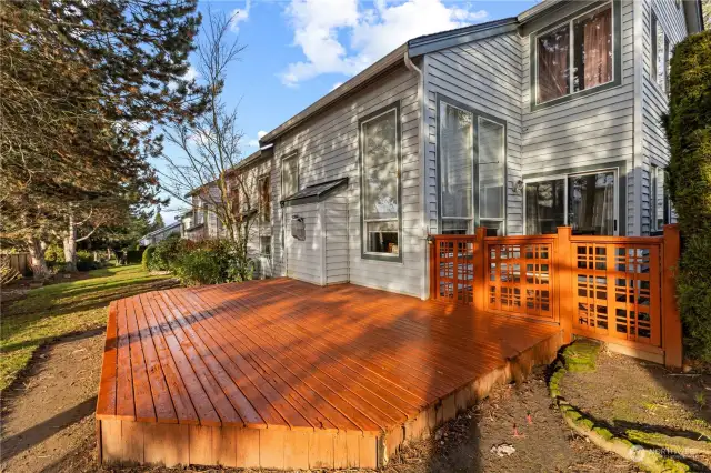 Enjoy the outdoors on this spacious deck surrounded by park-like grounds!