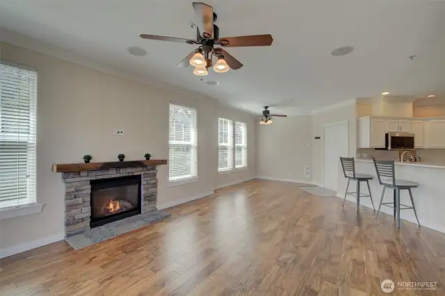 Engineered hardwood floors extend throughout the main living areas.