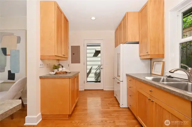 Looking out to 2nd private patio off the kitchen.