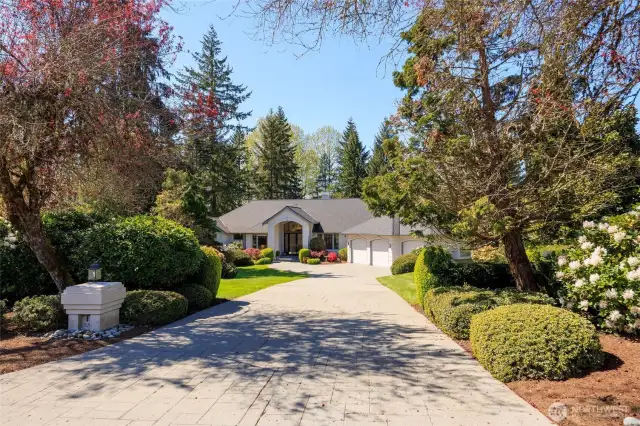 Perfectly situated on one of the best lots in Echo Falls with the longest driveway offering peace & privacy!