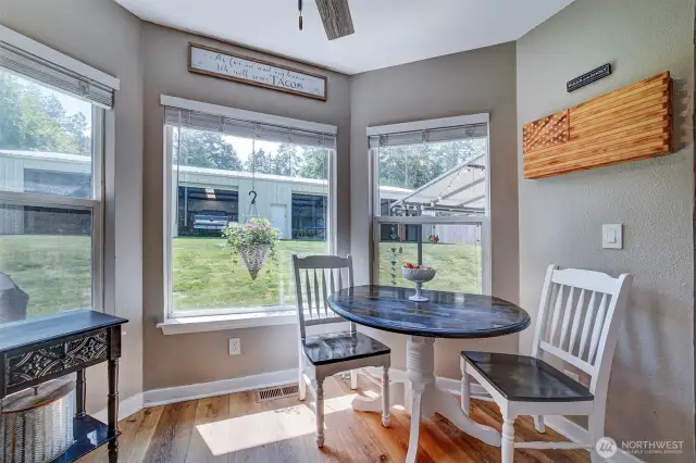At the end of the kitchen is a eat-in nook with lots of natural sunlight!