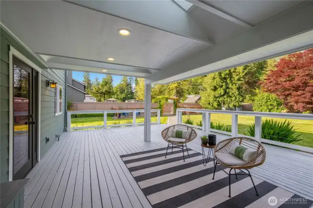 Covered deck (with skylights!) for year round memory making. Large enough...