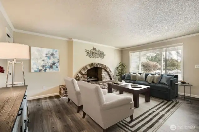 Virtually staged. Stylish laminate flooring flows throughout the main living areas.
