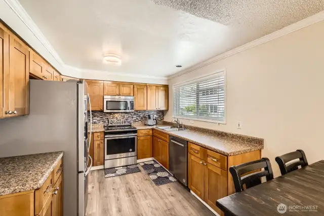 Stainless appliances add to the appeal of this kitchen.