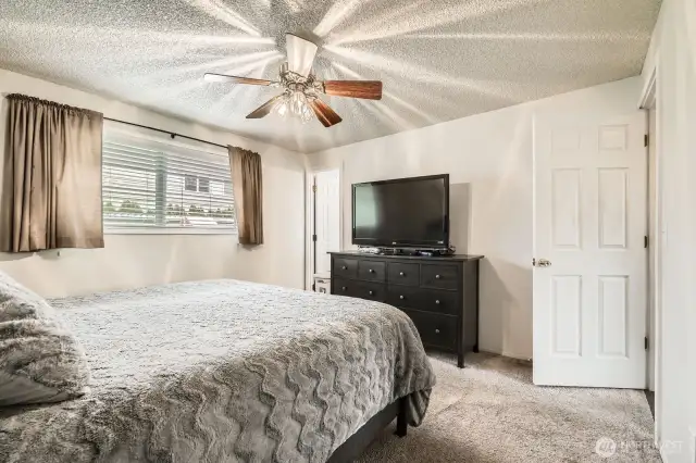 Another view of the primary bedroom.