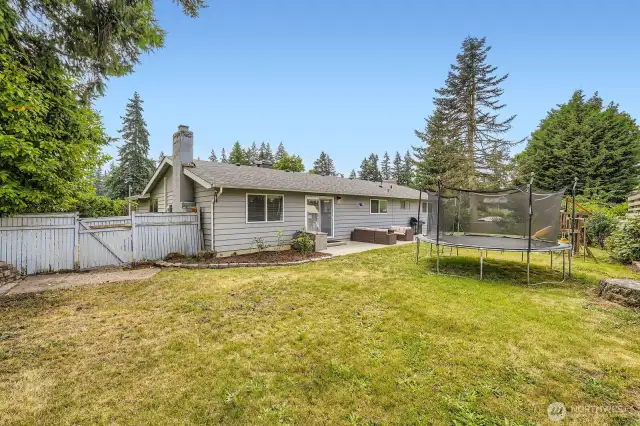 Fenced backyard adds privacy.