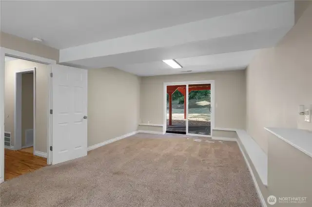 Spacious FR, slider to covered patio.