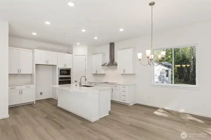 ***Actual Home ***   Lots of work space with large island.