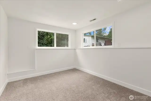 Downstairs bedroom - great flex space for home office or gym