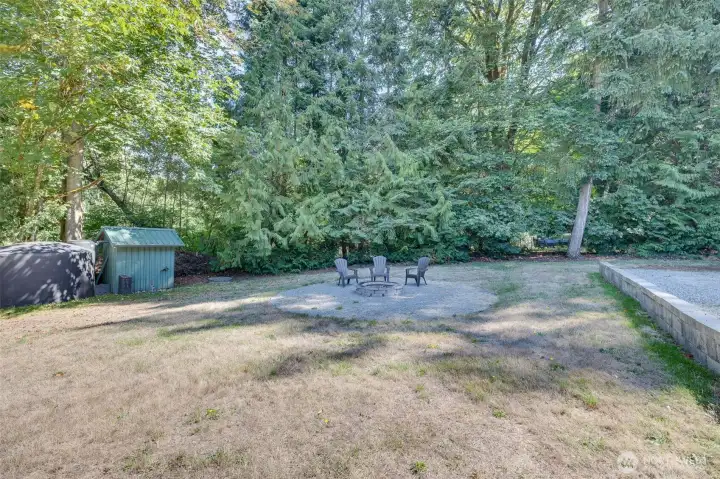 Firepit, well house, and 2,500 gallon water reserve tank