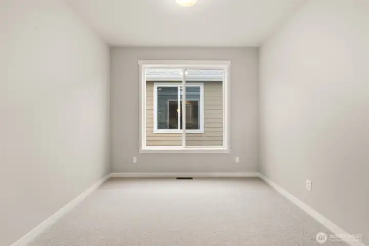 Double glass French doors lead to office/den in the heart of the main floor.