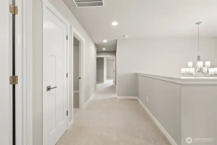 Second floor landing with ample space and plenty of light.