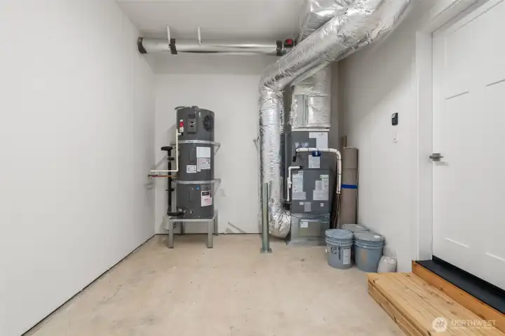 High efficiency Carrier electric forced-air furnace and Electric hybrid water heater