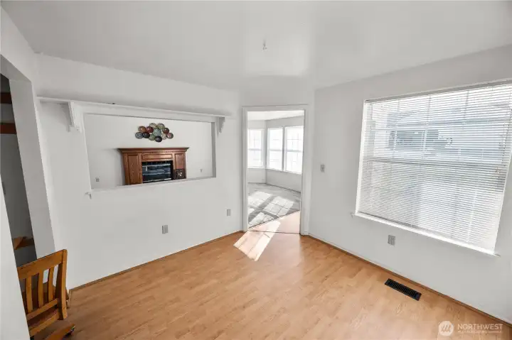 the den has an opening that looks into the living room, replace the door to make it a 4th bedroom!