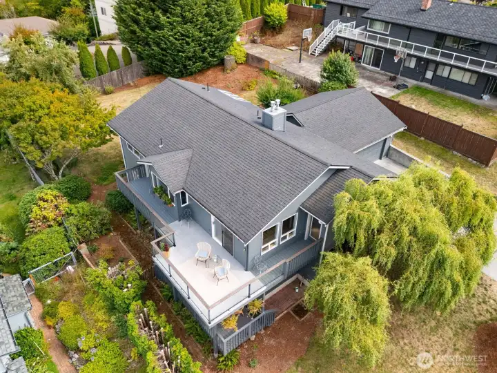 Spacious outdoor patio with lovely mountain views as well as glimpses of the bay!