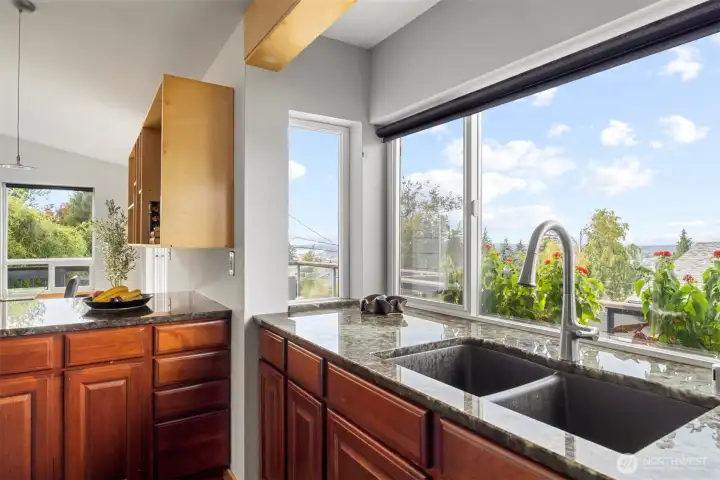 Imagine all the herbs you could grow in the gigantic window over the sink