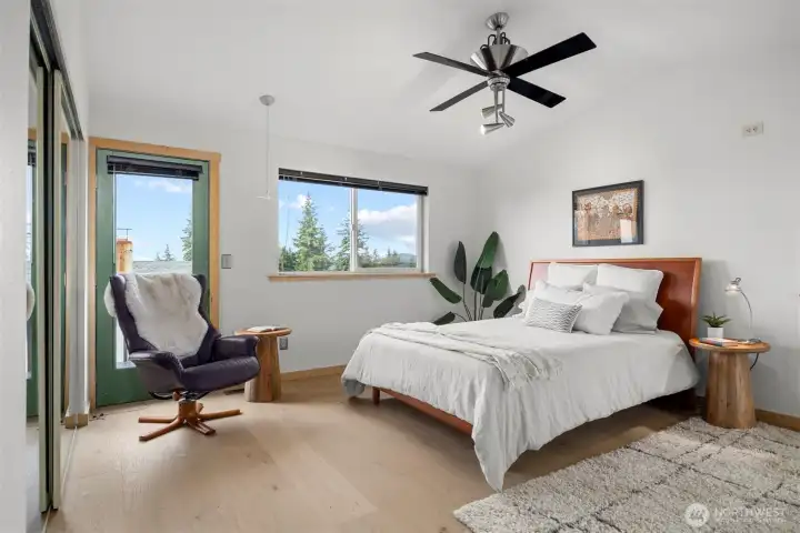 The primary bedroom has lovely views and tons of space