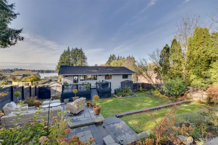 View of the terraced backyard, view patio and deck