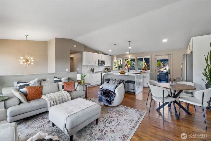 Great room with living room, dining area and gourmet kitchen