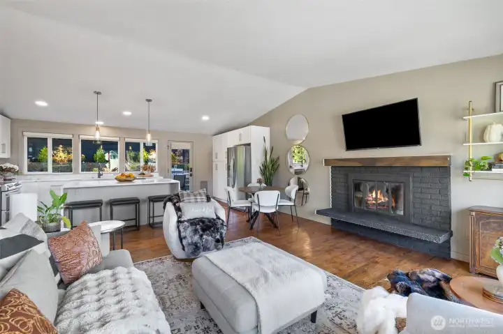 Additional view of the living room and kitchen